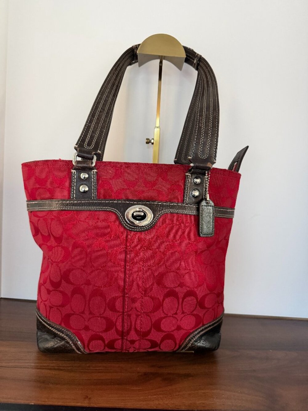 Coach Signature C canvas tote bag with dark leather trim & turn-lock front